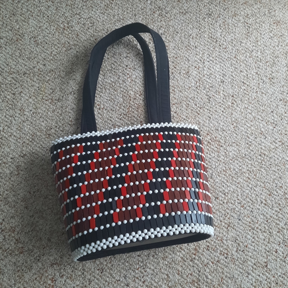 Gorgeous beaded purse, mixed of colors. Red,black,white. In great condition
